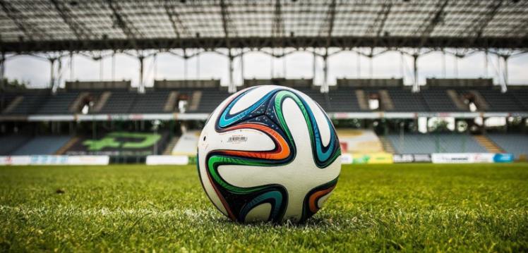 Soccer ball on football pitch